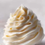 Delicious Vanilla Buttercream Frosting on a cake